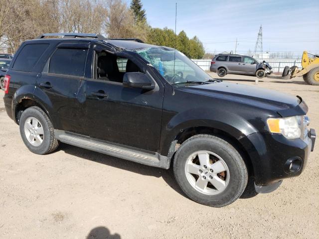 Photo 4 from auction – 2011 FORD ESCAPE LIM with VIN 1FMCU9EG3BKA94843