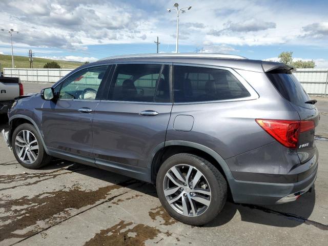 Photo 2 from auction – 2018 HONDA PILOT TOUR with VIN 5FNYF6H99JB010021
