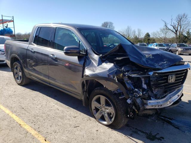 Photo 4 from auction – 2022 HONDA RIDGELINE with VIN 5FPYK3F79NB026552