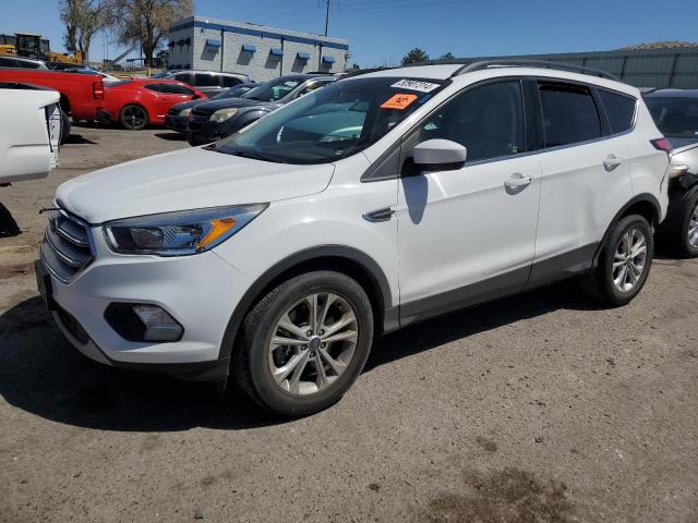 FORD ESCAPE SE 2018 with VIN 1FMCU9GD3JUB61527 - Photo from auction