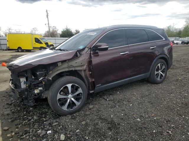 KIA SORENTO EX 2016 with VIN 5XYPHDA1XGG010030 - Photo from auction