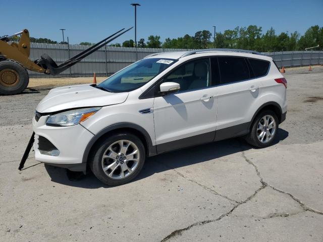 FORD ESCAPE TIT 2016 with VIN 1FMCU0JX7GUC85842 - Photo from auction