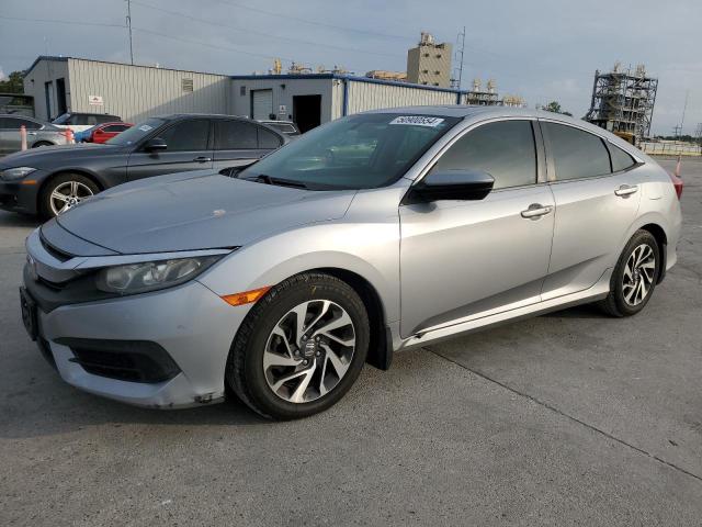 HONDA CIVIC EX 2017 with VIN 19XFC2F71HE036011 - Photo from auction