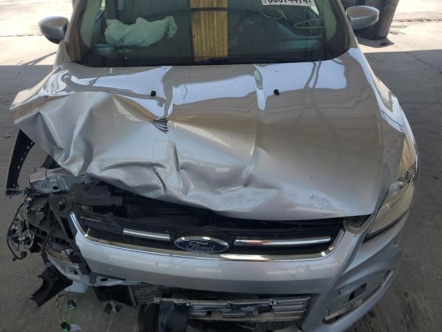 Photo 11 from auction – 2015 FORD ESCAPE TIT with VIN 1FMCU0J98FUA03904