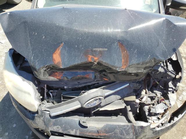 Photo 11 from auction – 2014 FORD FOCUS SE with VIN 1FADP3F22EL105531