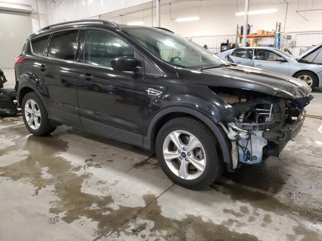 Photo 4 from auction – 2015 FORD ESCAPE SE with VIN 1FMCU9G98FUC29260