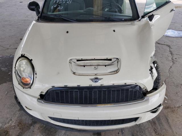 Photo 11 from auction – 2009 MINI COOPER S with VIN WMWMF735X9TT95524