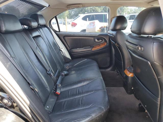 Photo 10 from auction – 2002 INFINITI I35 with VIN JNKDA31A22T027689