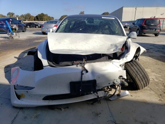 Photo 5 from auction – 2021 TESLA MODEL 3 with VIN 5YJ3E1EA4MF929833