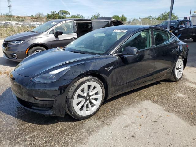 TESLA MODEL 3 2023 with VIN 5YJ3E1EA4PF430566 - Photo from auction