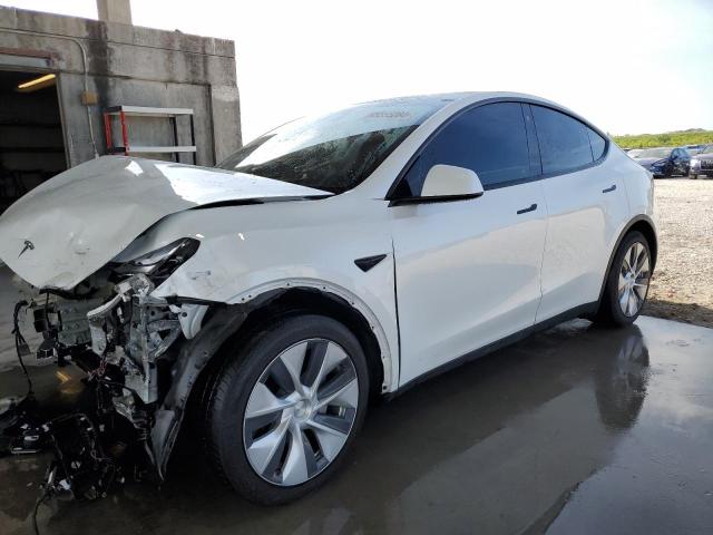 TESLA MODEL Y 2022 with VIN 7SAYGAEE3NF310034 - Photo from auction