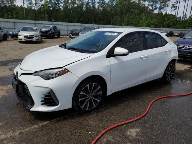 TOYOTA COROLLA L 2017 with VIN 2T1BURHE4HC769376 - Photo from auction