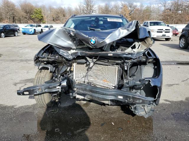 Photo 5 from auction – 2015 BMW X1 XDRIVE2 with VIN WBAVL1C54FVY28474