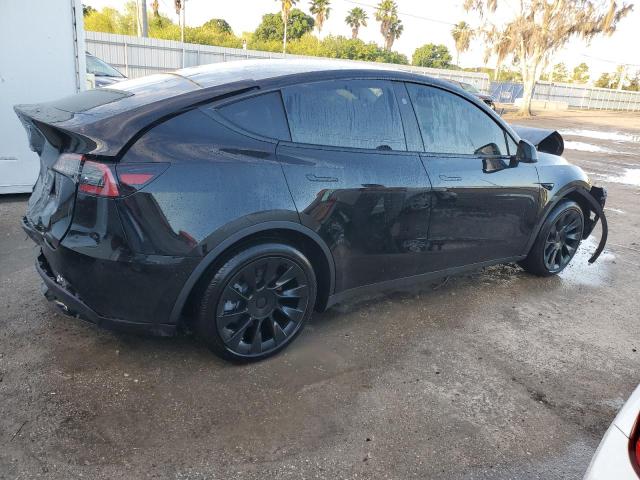 Photo 3 from auction – 2023 TESLA MODEL Y with VIN 7SAYGDED3PF950045