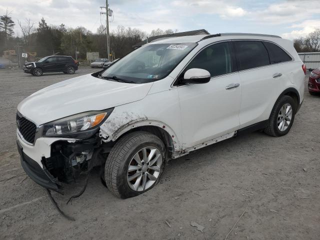 KIA SORENTO LX 2016 with VIN 5XYPG4A33GG030589 - Photo from auction