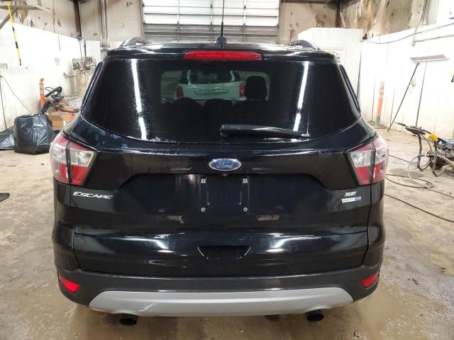 Photo 6 from auction – 2018 FORD ESCAPE SE with VIN 1FMCU9GD0JUA73793