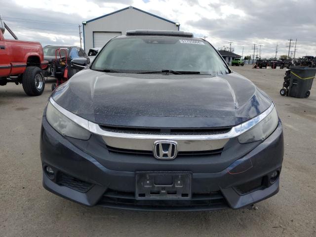 Photo 5 from auction – 2016 HONDA CIVIC TOUR with VIN 19XFC1F92GE215930