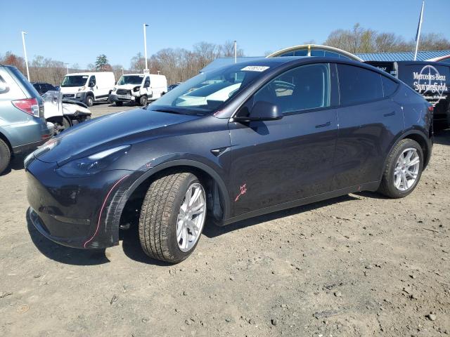 TESLA MODEL Y 2024 with VIN 7SAYGDEEXRF034197 - Photo from auction