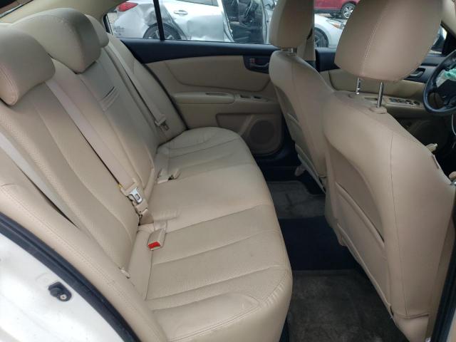 Photo 10 from auction – 2009 KIA OPTIMA LX with VIN KNAGE228595292496