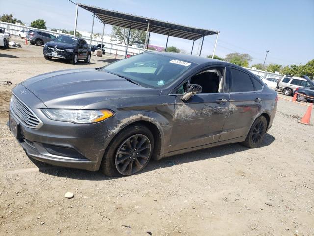 FORD FUSION SE 2018 with VIN 3FA6P0LU6JR129159 - Photo from auction