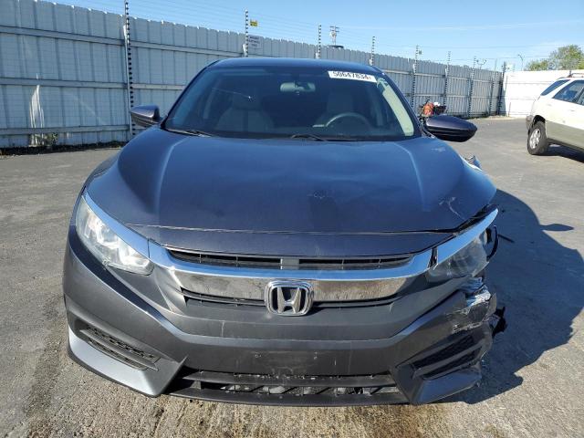 Photo 5 from auction – 2018 HONDA CIVIC LX with VIN 2HGFC2F50JH522691