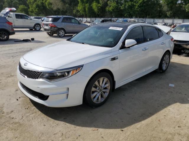 KIA OPTIMA EX 2018 with VIN 5XXGU4L32JG244698 - Photo from auction
