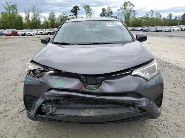 Photo 5 from auction – 2018 TOYOTA RAV4 LE with VIN JTMZFREV0JJ152452