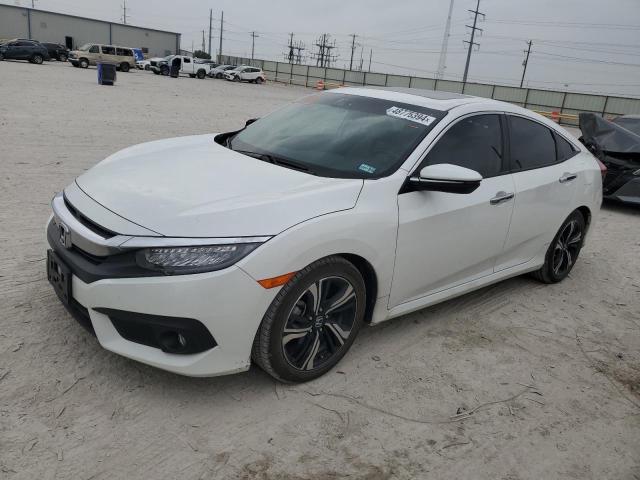 Photo 1 from auction – 2017 HONDA CIVIC TOUR with VIN 19XFC1F91HE027241