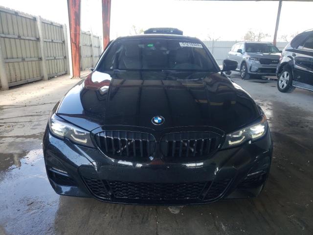 Photo 5 from auction – 2022 BMW 330I with VIN 3MW5R1J09N8C67146
