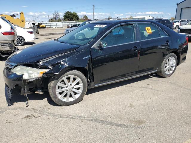 TOYOTA CAMRY HYBR 2012 with VIN 4T1BD1FK6CU048137 - Photo from auction