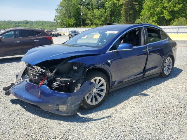 TESLA MODEL X 2018 with VIN 5YJXCAE23JF101977 - Photo from auction