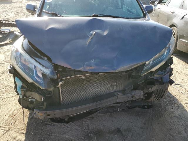 Photo 12 from auction – 2015 HONDA CR-V EX with VIN 2HKRM4H50FH695031