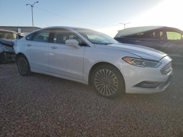 Photo 4 from auction – 2018 FORD FUSION TIT with VIN 3FA6P0D95JR124030