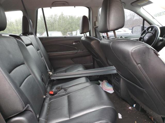 Photo 11 from auction – 2021 HONDA PILOT EXL with VIN 5FNYF6H57MB073295