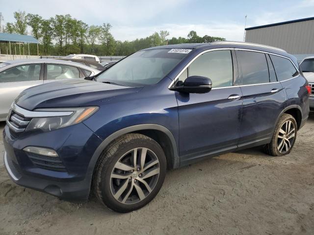HONDA PILOT TOUR 2016 with VIN 5FNYF6H93GB043492 - Photo from auction
