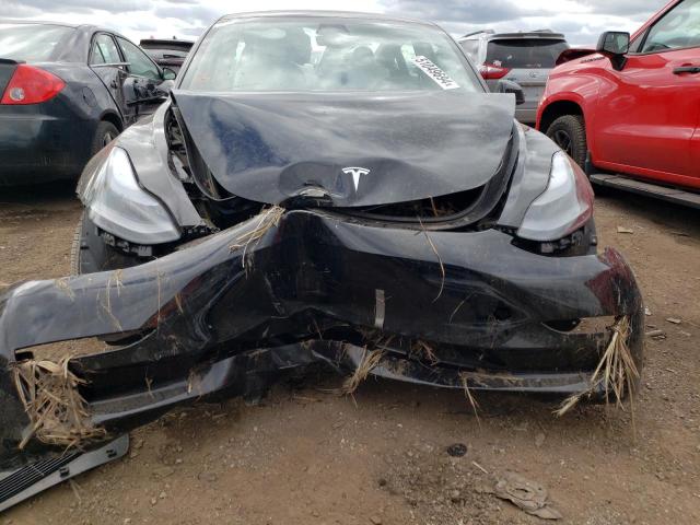 Photo 5 from auction – 2023 TESLA MODEL 3 with VIN 5YJ3E1EB7PF660577