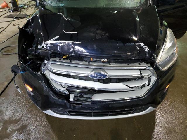 Photo 11 from auction – 2018 FORD ESCAPE SE with VIN 1FMCU0GDXJUC03140