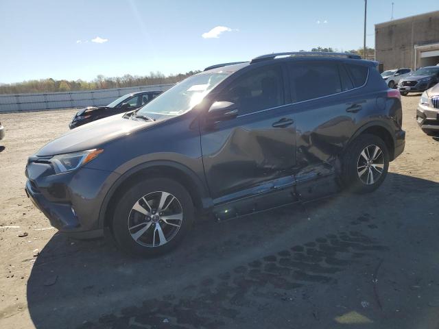TOYOTA RAV4 XLE 2017 with VIN JTMWFREV0HJ718803 - Photo from auction