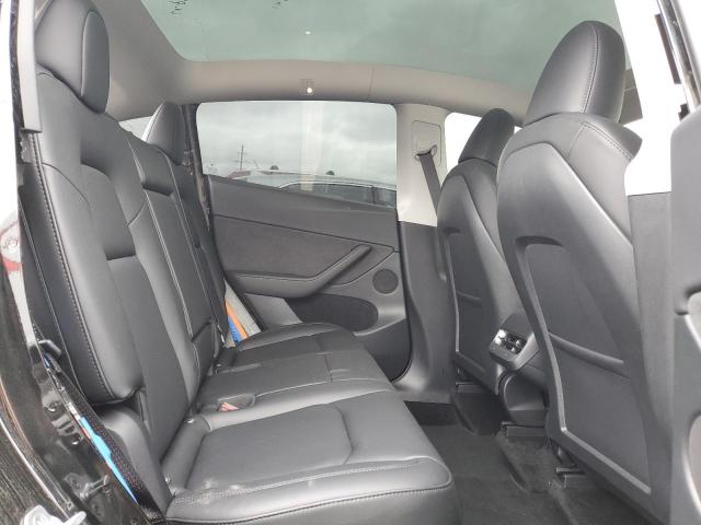 Photo 11 from auction – 2023 TESLA MODEL Y with VIN 7SAYGDEF7PF884519