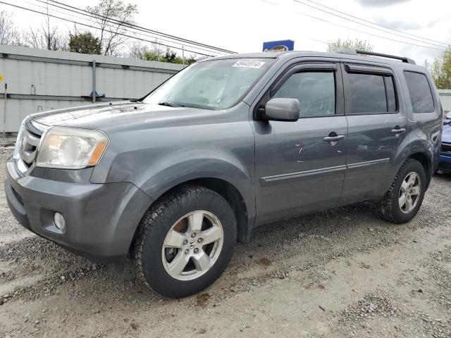 HONDA PILOT EXLN 2011 with VIN 5FNYF4H7XBB106275 - Photo from auction