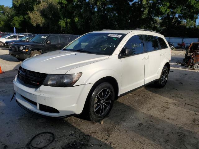 DODGE JOURNEY SE 2017 with VIN 3C4PDCAB0HT670876 - Photo from auction