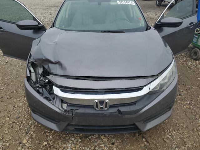 Photo 11 from auction – 2018 HONDA CIVIC LX with VIN 19XFC2F53JE018405