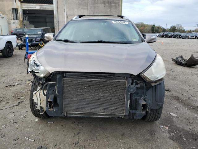 Photo 5 from auction – 2012 HYUNDAI TUCSON GLS with VIN KM8JUCAC7CU461689