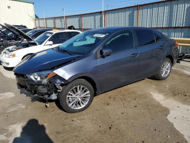 TOYOTA COROLLA L 2014 with VIN 5YFBURHE5EP048432 - Photo from auction