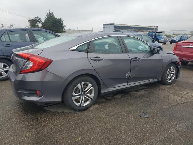 Photo 3 from auction – 2017 HONDA CIVIC LX with VIN 19XFC2F57HE032091