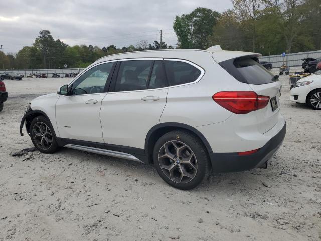 Photo 2 from auction – 2016 BMW X1 with VIN WBXHT3C30G5E56763