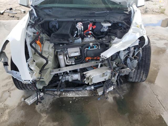 Photo 11 from auction – 2023 TESLA MODEL Y with VIN 7SAYGDEE6PA130158
