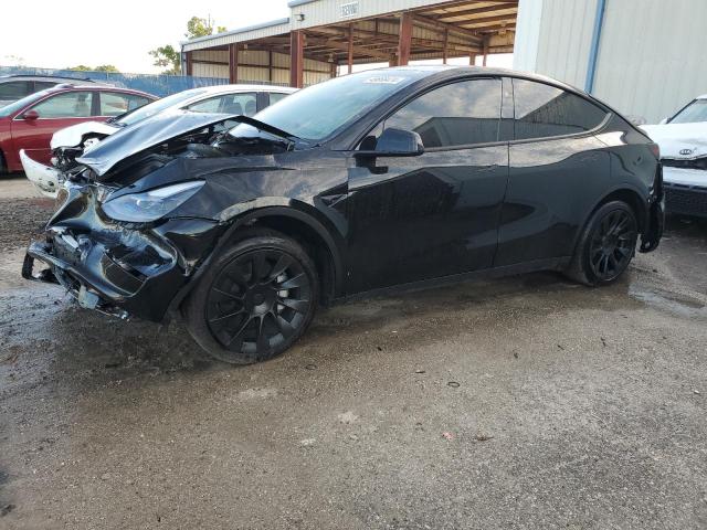 TESLA MODEL Y 2023 with VIN 7SAYGDED3PF950045 - Photo from auction