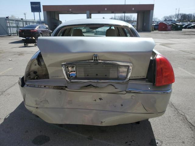 Photo 6 from auction – 2004 LINCOLN TOWN CAR E with VIN 1LNHM81W94Y648223