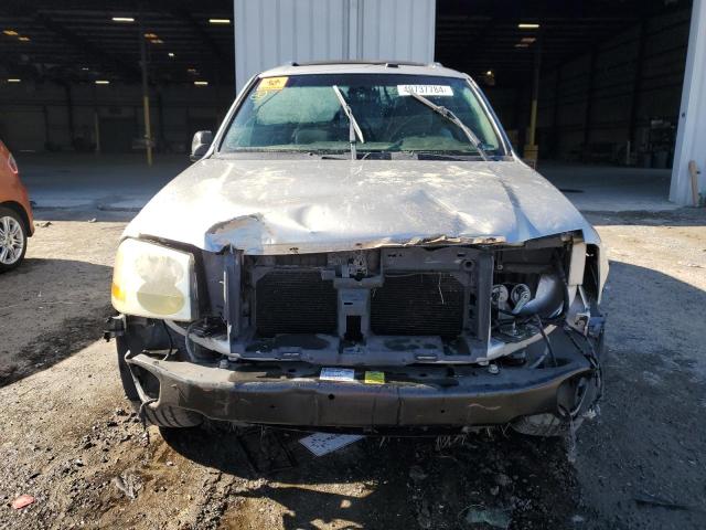 Photo 5 from auction – 2004 GMC ENVOY XUV with VIN 1GKES12S246145553